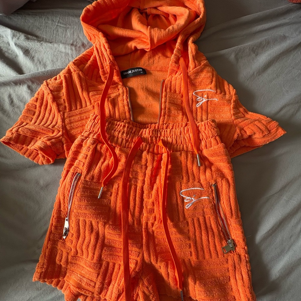 Shane Justin orange towel shorts set